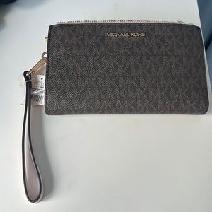Brand new, never used Michael Kors brown and pink wristlet